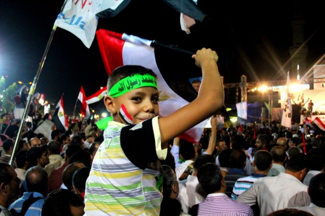 A young child participates in an Egyptian protest. Picture by:  Ramy Noaman